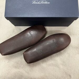 Some leather slip on for around house.